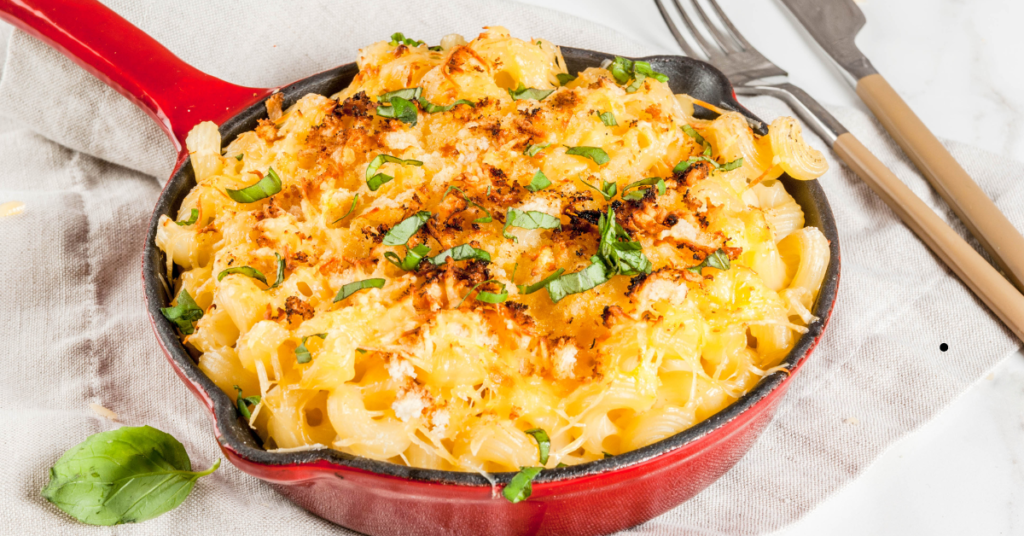 mac and cheese in a red skillet