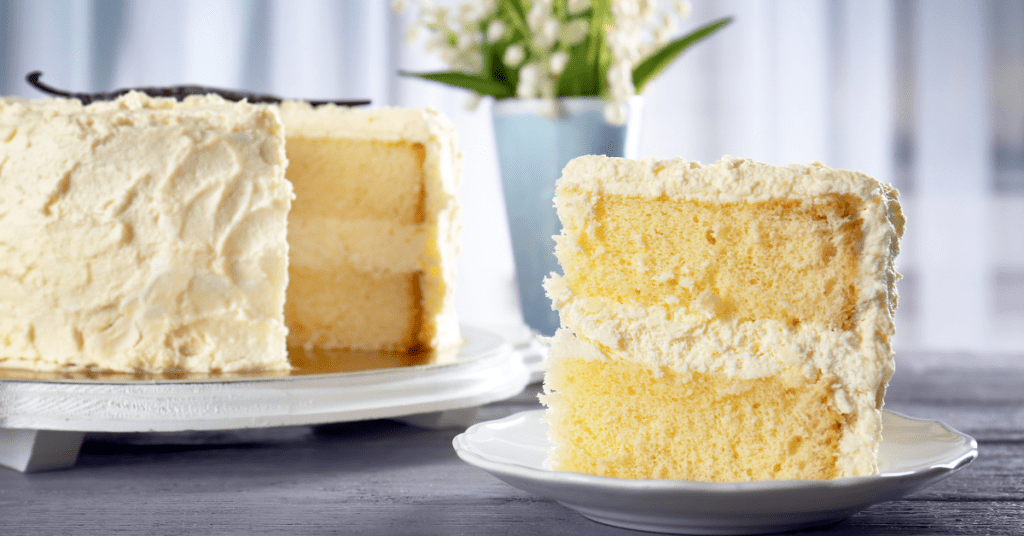 classic vanilla cake slice of cake cut from round cake